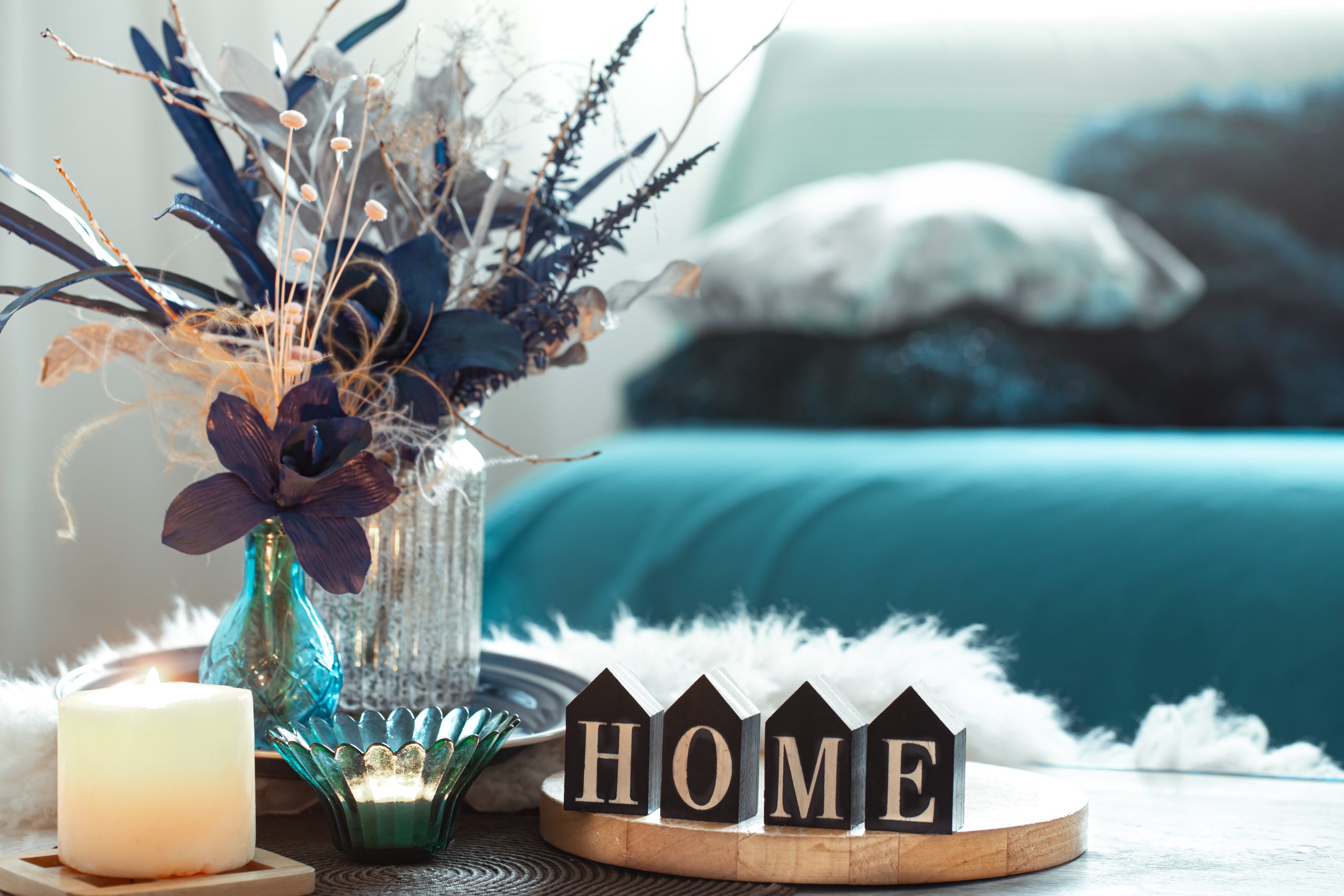 still life blue tones with wooden inscription home decorative elements living room scaled