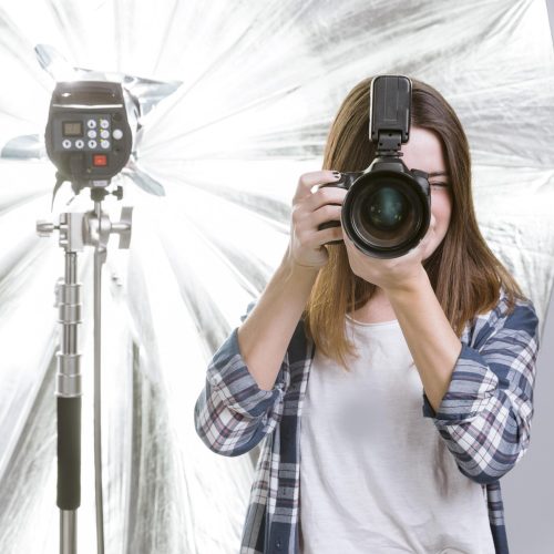 photographer-holding-professional-camera